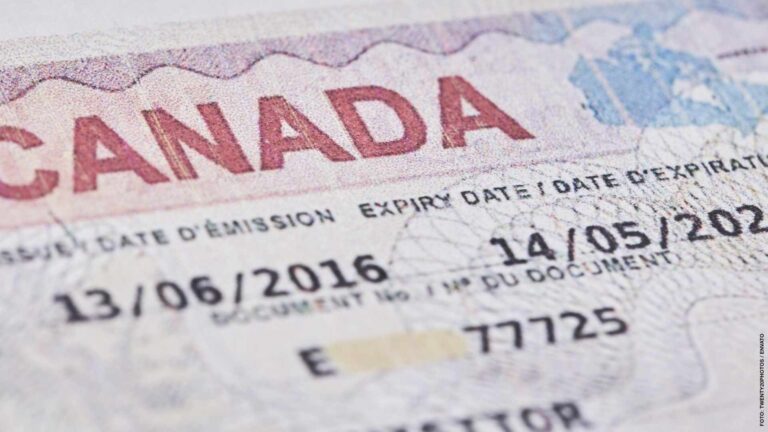 Canadian visa in passport. Close-up view