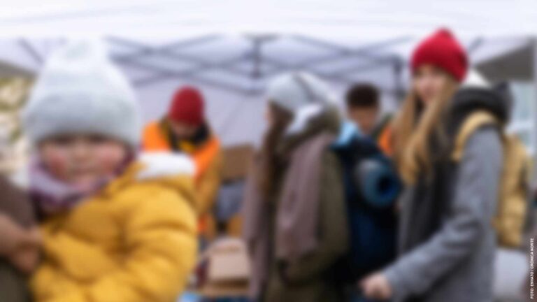 Ukrainian immigrants crossing border and getting donations from volunteers, Ukrainian war concept.