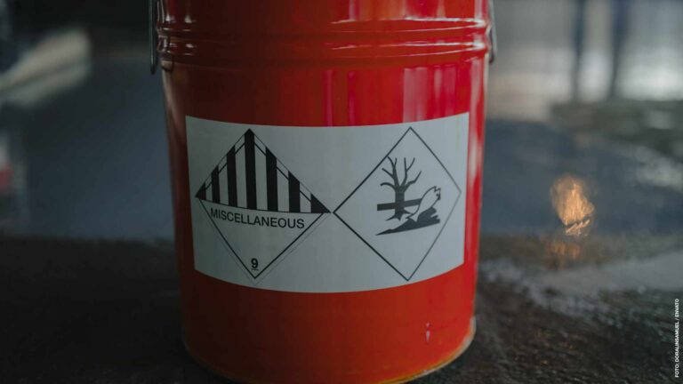 Tin bucket with toxic composition and epoxy resin inside