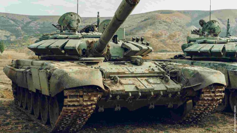 Russian battle tanks at tankodrome in mountains