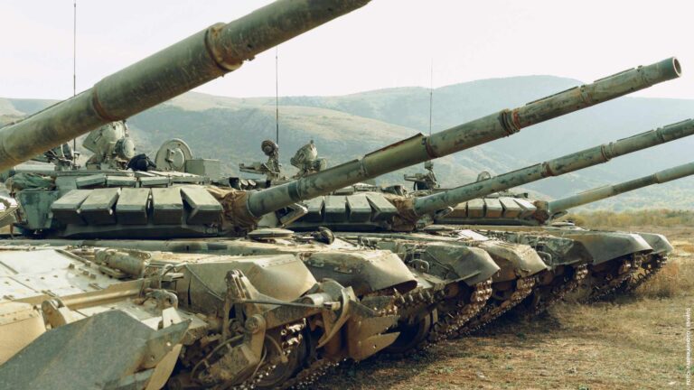 Russian battle tanks at tankodrome in mountains