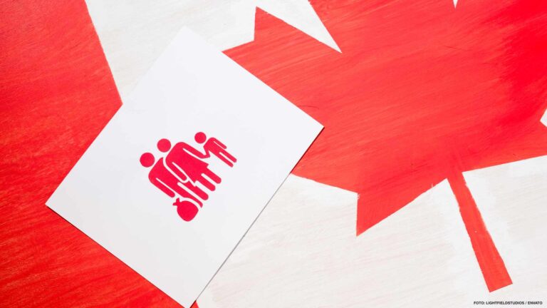 white card with family icon on canadian flag, immigration concep