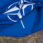 NATO flag.North Atlantic Treaty Organization flag waving.
