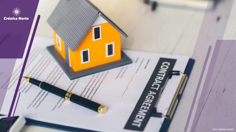 A model house placed on the house purchase contract Real estate