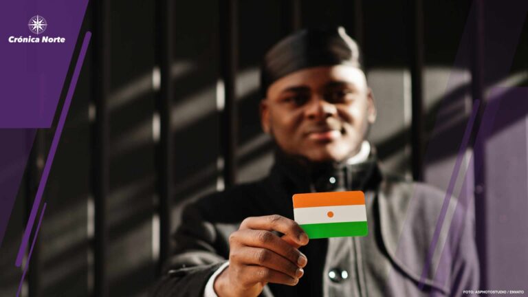 Young african man hold flag