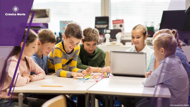 happy children with laptop at robotics school