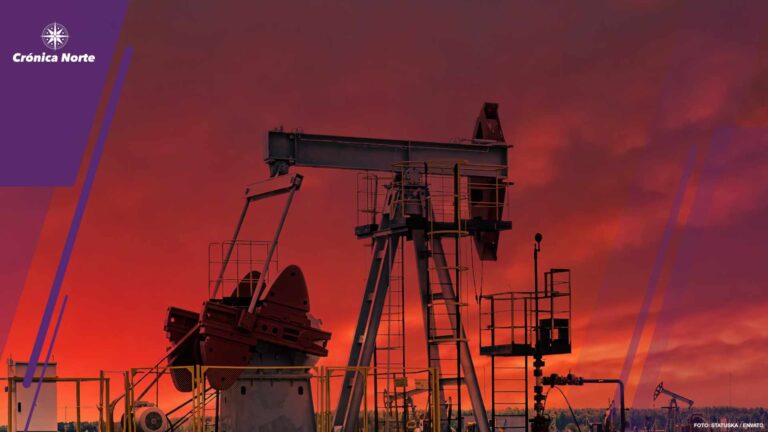 Oil drill rig and pump jack at sunset background.