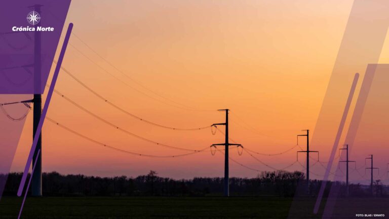 High voltage power tower over sunset clear sky, blackout concept