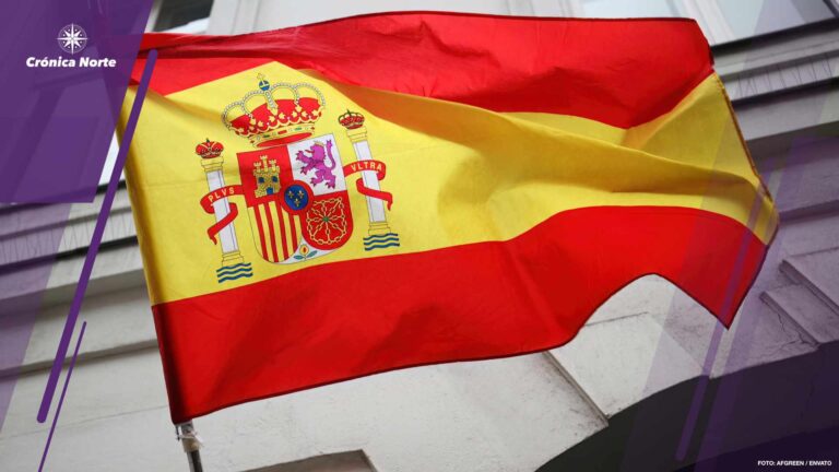 Spain flag waving on a building
