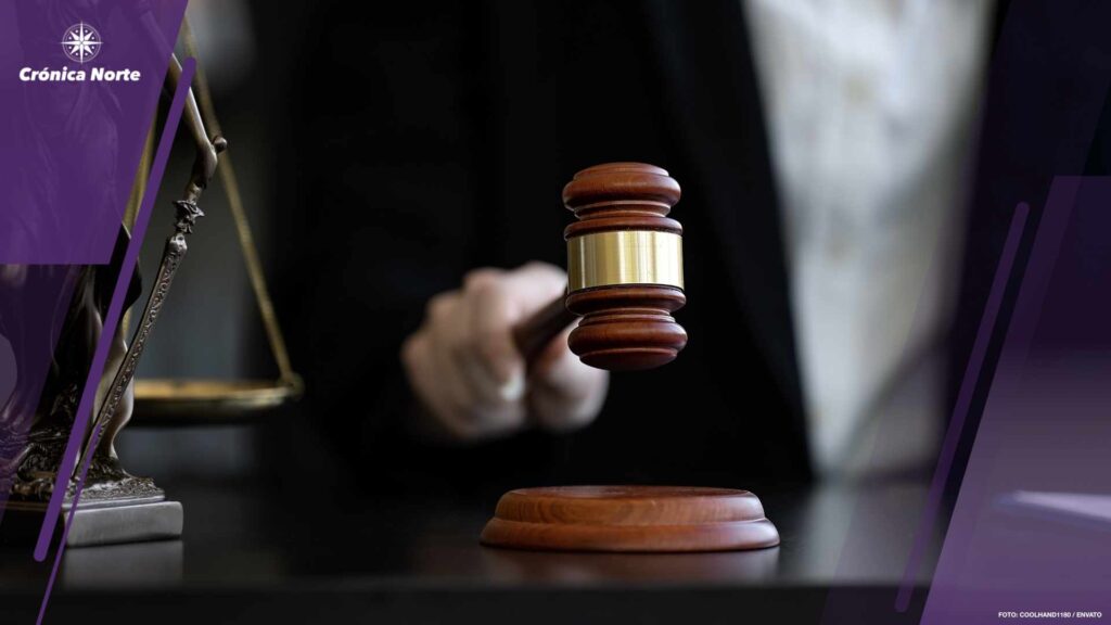 justice and law concept. Closeup judge hand holding gavel in a c