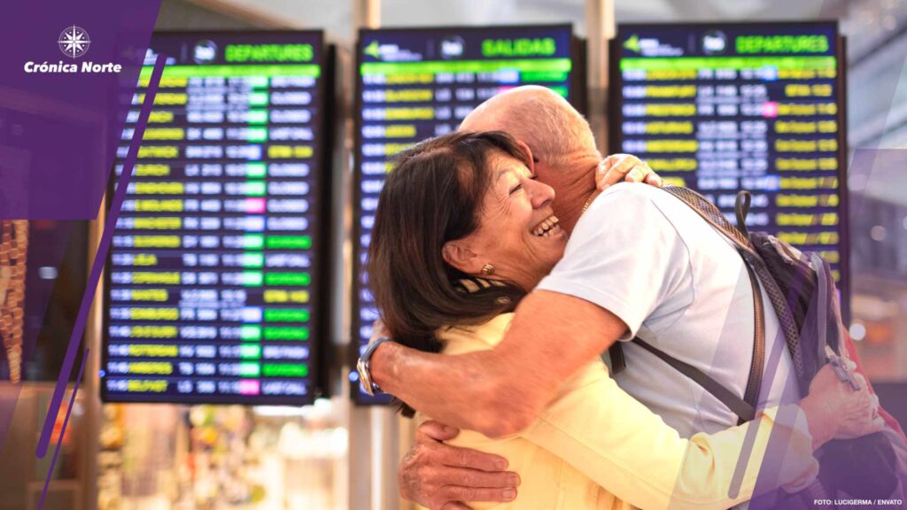 Meeting in the airport terminal. Travel, family hug at the airpo