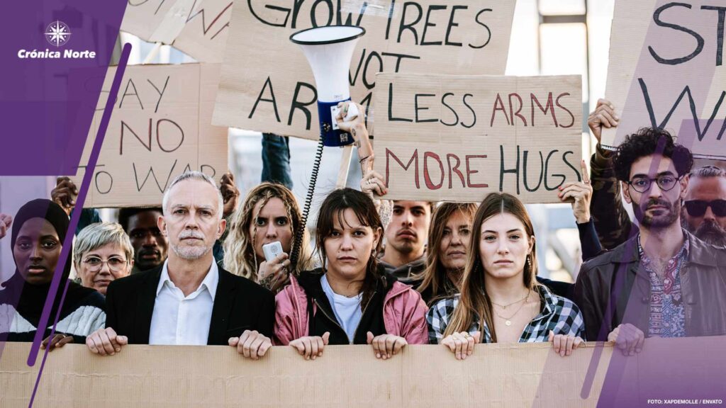 Big organized group of diverse people demonstrating in favor of world peace.