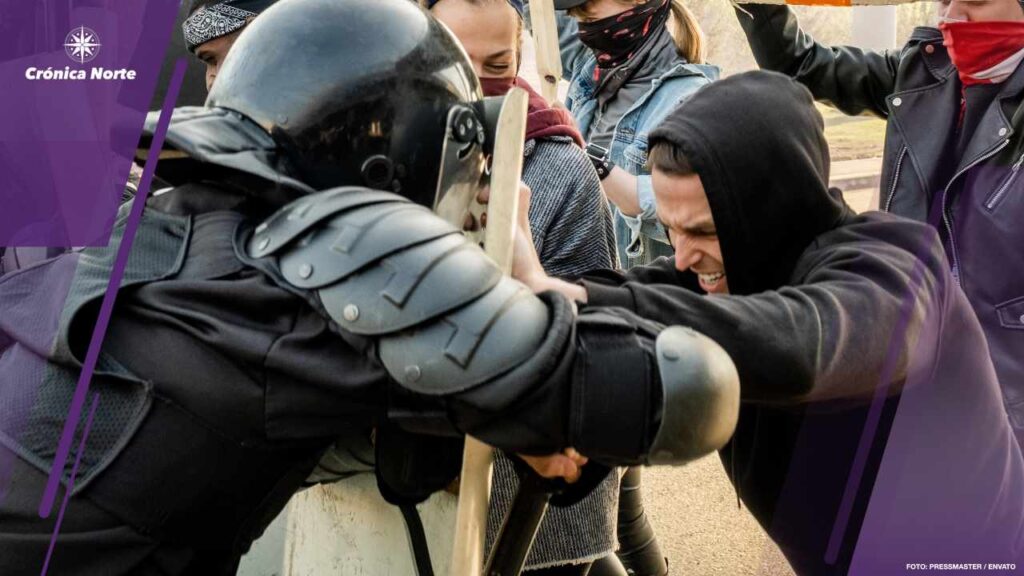 Fighting against protesting people at rally