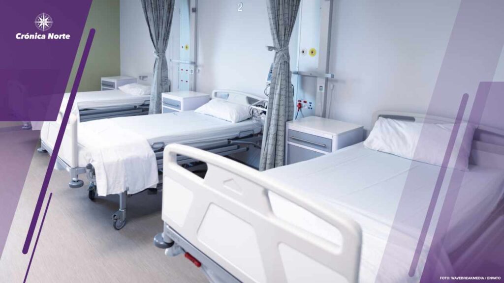 General view of an empty hospital room with three beds. medicine, health and healthcare services.