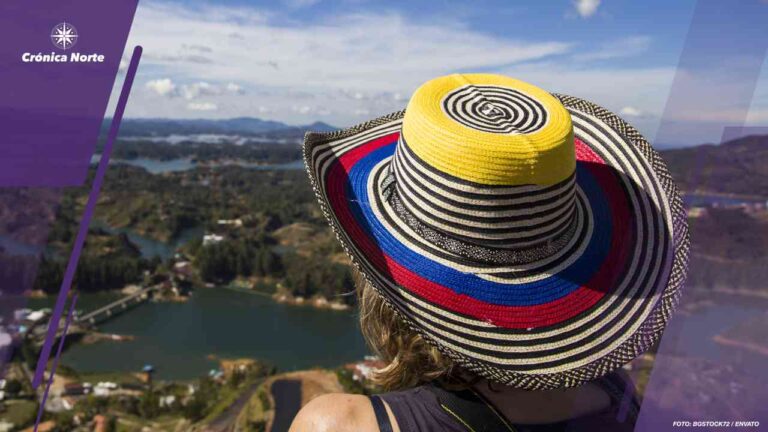 Young woman at Guatape lake in Antioquia, Colombia